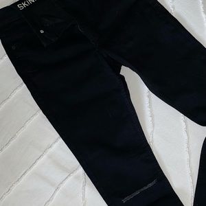 High-Waisted Ripped Skinny Jeans